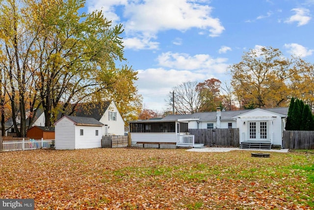 back of property featuring french doors