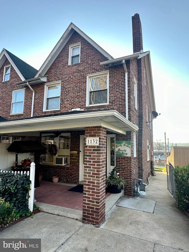 view of property with covered porch