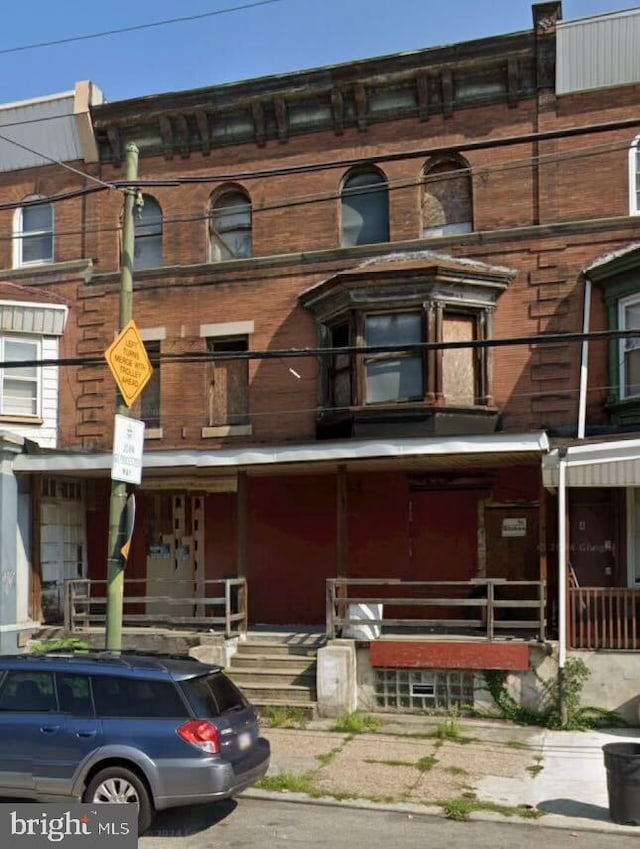 4023 W Girard Ave, Philadelphia, PA 19104 - view of front of house featuring brick siding and a balcony