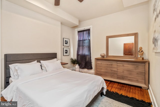 bedroom featuring hardwood / wood-style floors and ceiling fan