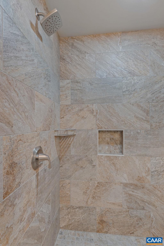 details with a tile shower