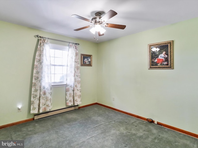 carpeted spare room featuring a baseboard heating unit and ceiling fan