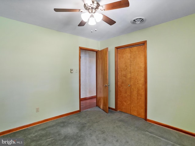 unfurnished bedroom with a closet, ceiling fan, and carpet floors