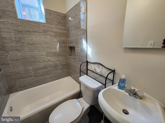 bathroom featuring sink and toilet