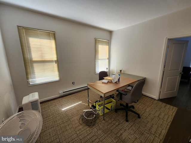 office area featuring a baseboard radiator and dark wood-type flooring