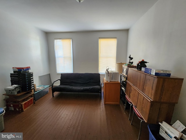 living area with dark hardwood / wood-style flooring