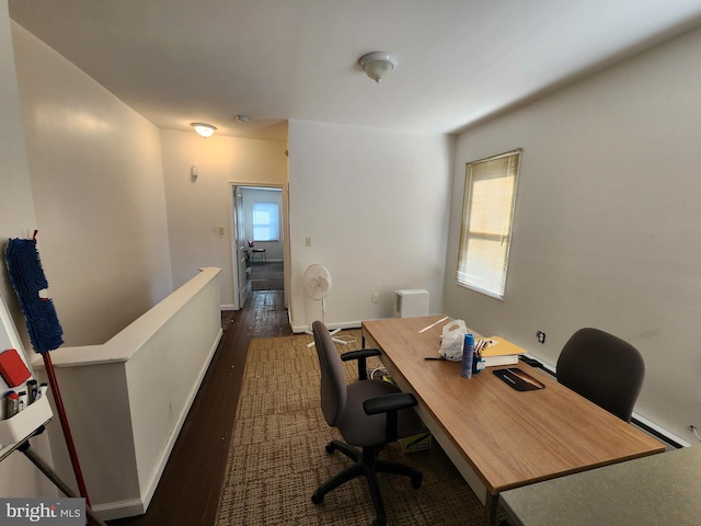 office area featuring dark wood-type flooring