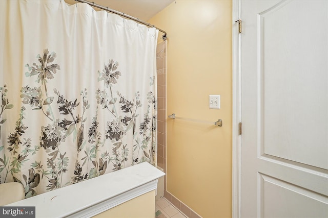 bathroom with tile patterned flooring