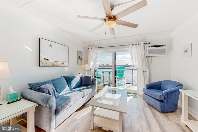 living room with ornamental molding, a wall mounted air conditioner, light hardwood / wood-style floors, and ceiling fan