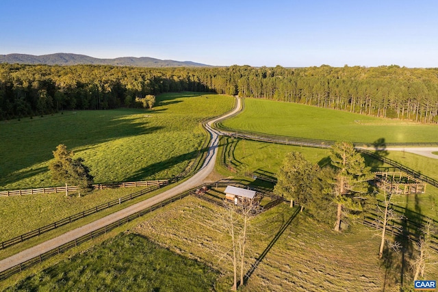 bird's eye view featuring a rural view and a mountain view