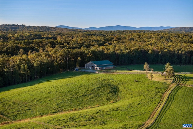 aerial view with a mountain view and a rural view