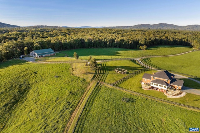 drone / aerial view with a mountain view and a rural view