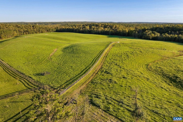 birds eye view of property featuring a rural view