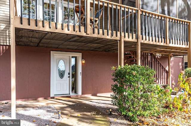 702 Ocean Pkwy, Ocean Pines, MD 21811 - view of exterior entry with stucco siding and a carport