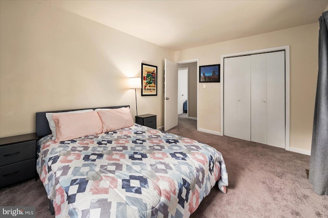 bedroom featuring a closet and carpet floors