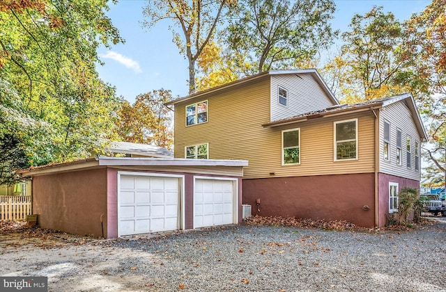 702 Ocean Pkwy, Ocean Pines, MD 21811 - rear view of house featuring a garage