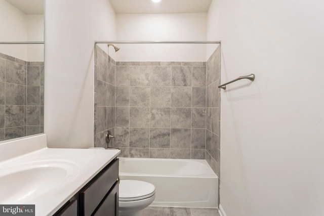 full bathroom featuring shower / bath combination, toilet, and vanity