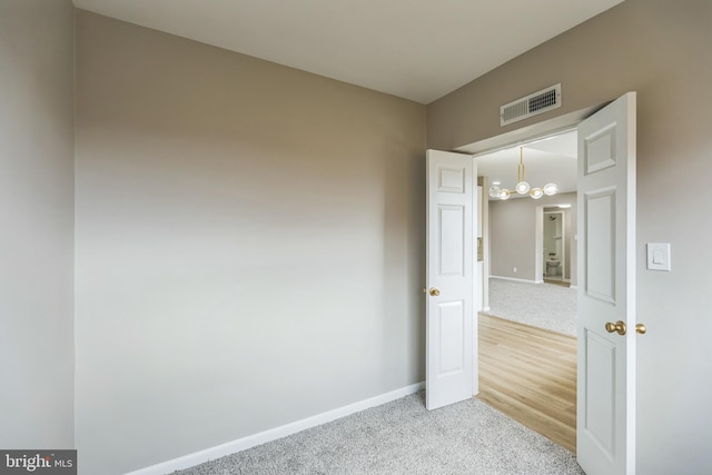 empty room featuring wood-type flooring