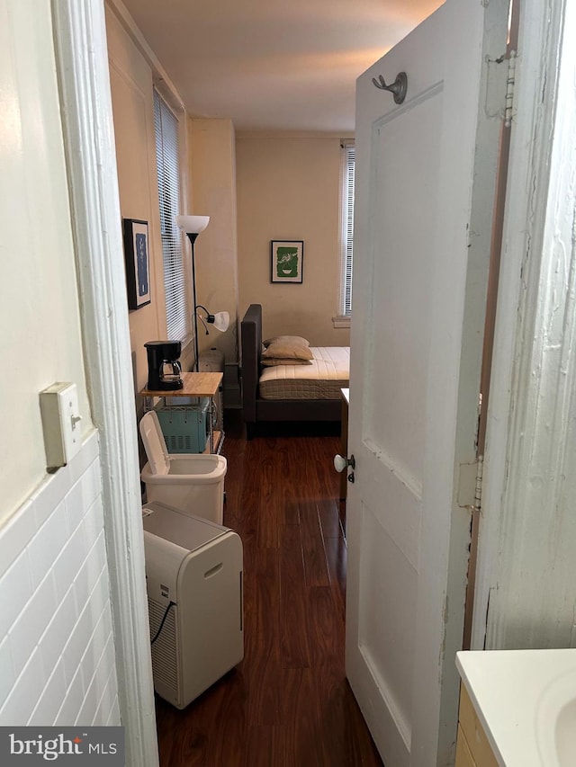 bathroom with vanity and hardwood / wood-style floors