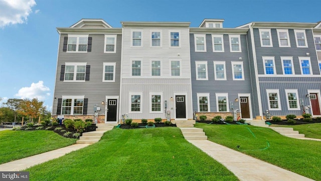 view of property with a front yard