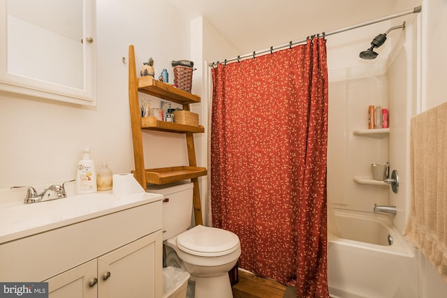 full bathroom with hardwood / wood-style floors, vanity, toilet, and shower / tub combo