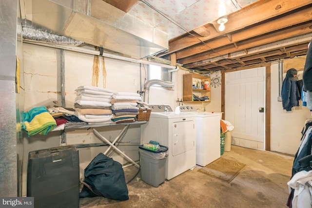 basement featuring separate washer and dryer