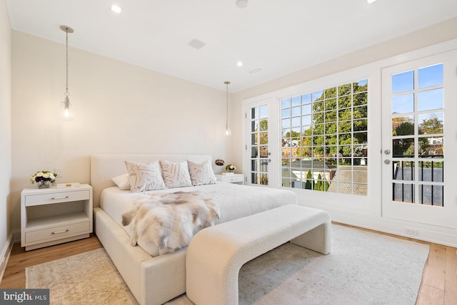 bedroom featuring wood-type flooring