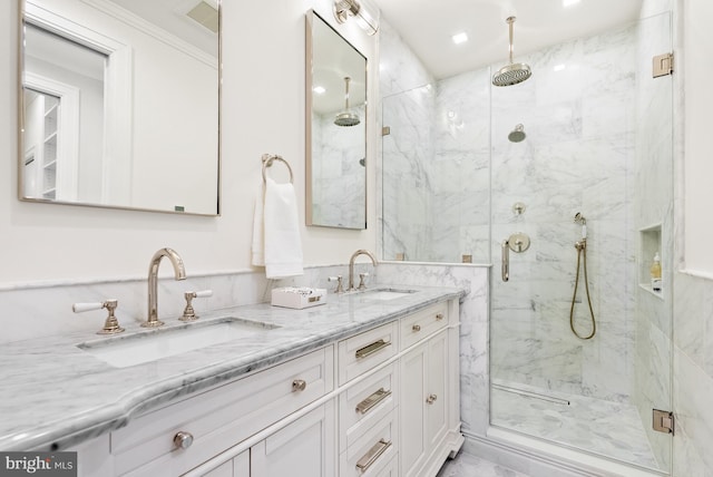 bathroom featuring vanity and walk in shower