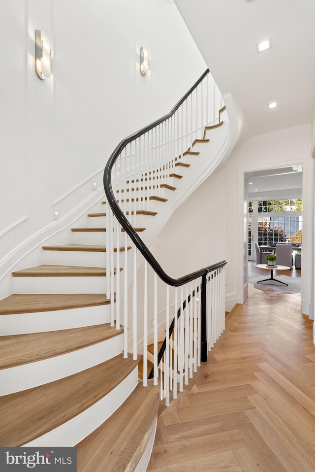 stairs with parquet flooring