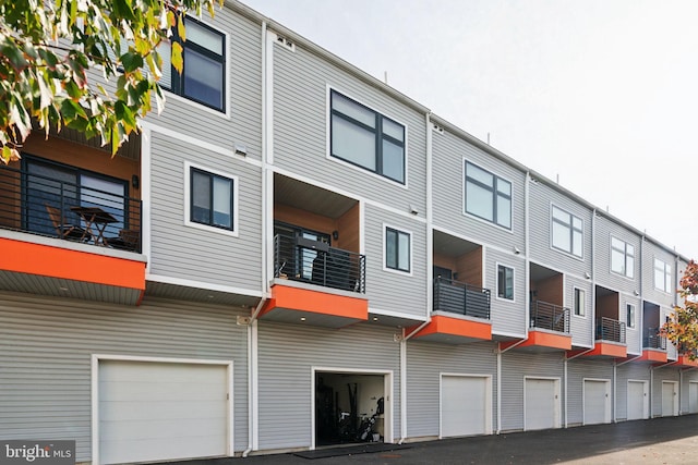 view of building exterior with a garage