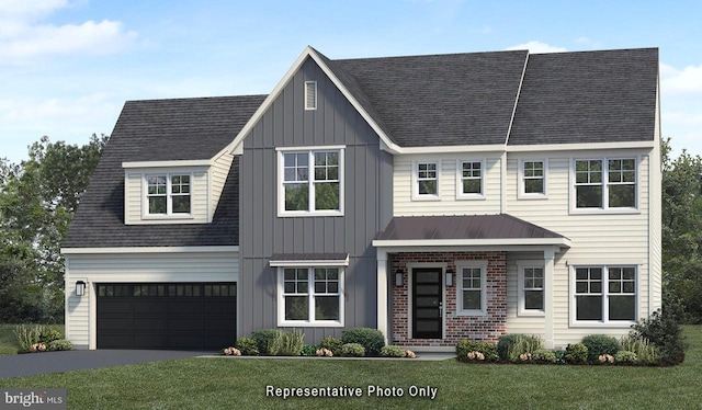 view of front of property featuring a garage and a front lawn