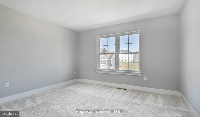 view of carpeted spare room