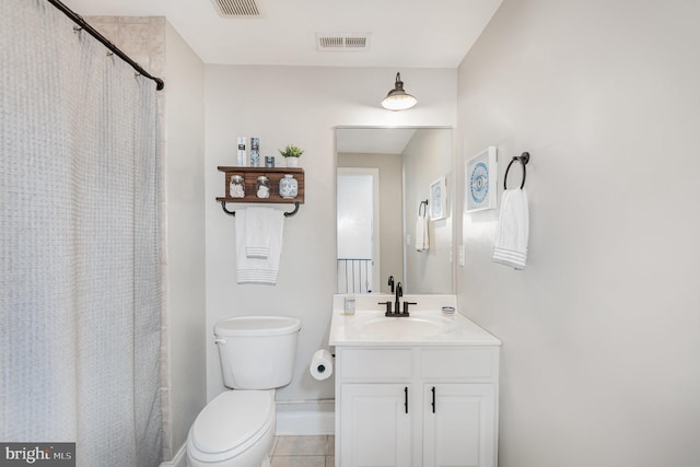 bathroom with a shower with curtain, tile patterned flooring, vanity, and toilet