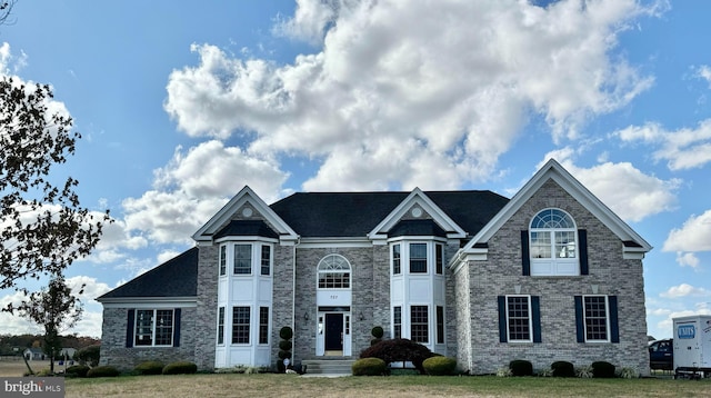 view of front property with a front yard