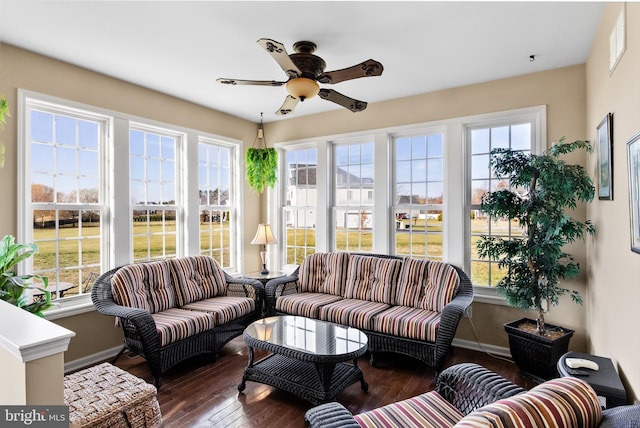 sunroom / solarium with ceiling fan