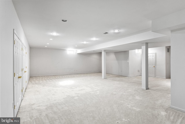 basement with light carpet