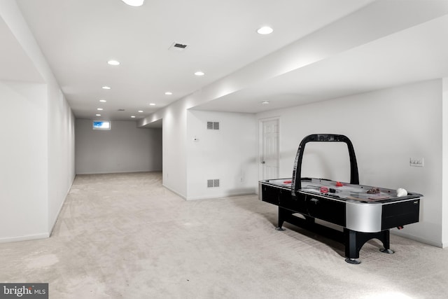 playroom featuring light carpet