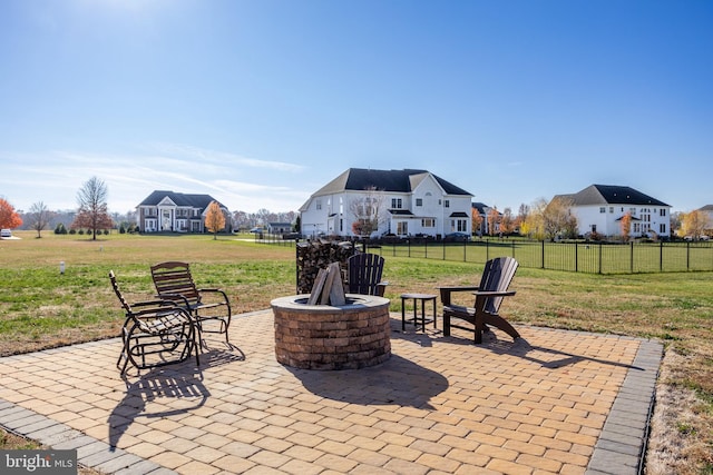 view of patio with a fire pit