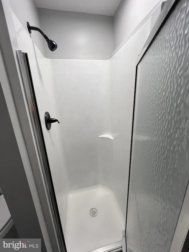 bathroom featuring a shower