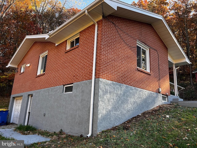 view of home's exterior with a garage