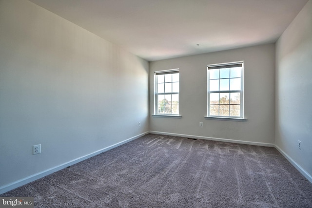 view of carpeted spare room