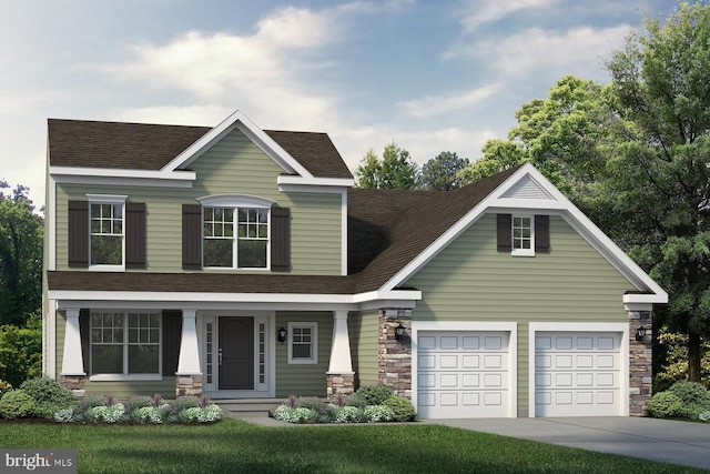 view of front of house featuring a front yard and a garage