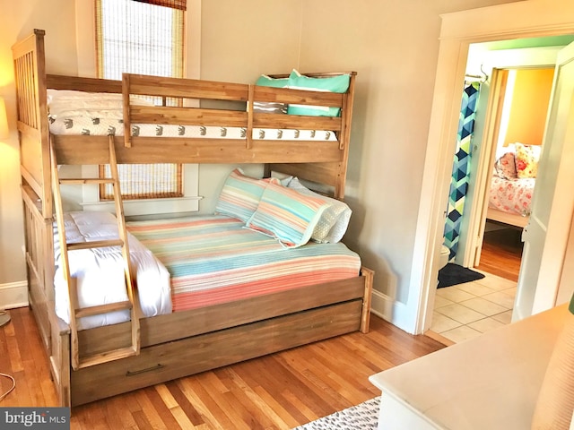 bedroom featuring light wood-type flooring