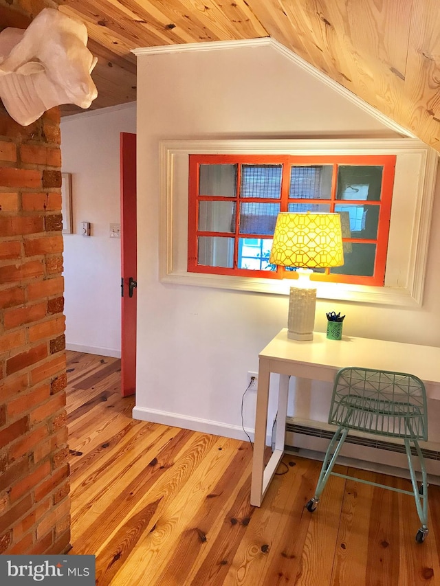 hall featuring light hardwood / wood-style floors, vaulted ceiling, ornamental molding, and wood ceiling