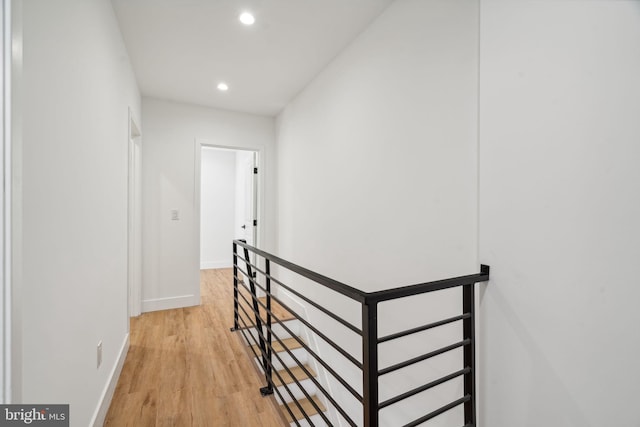 corridor featuring light hardwood / wood-style flooring