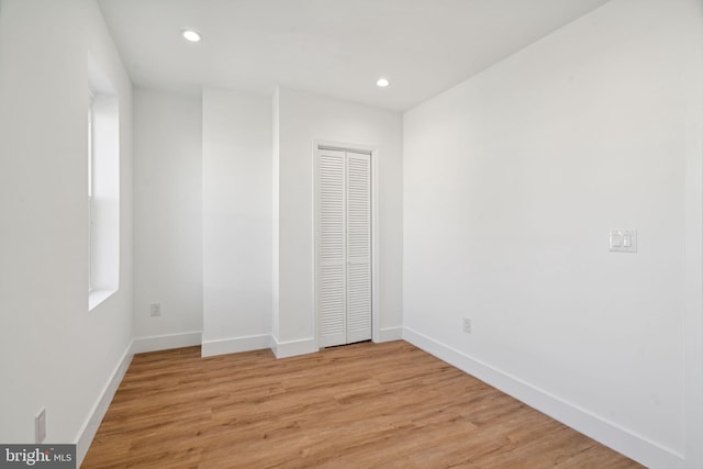 unfurnished bedroom with light hardwood / wood-style floors