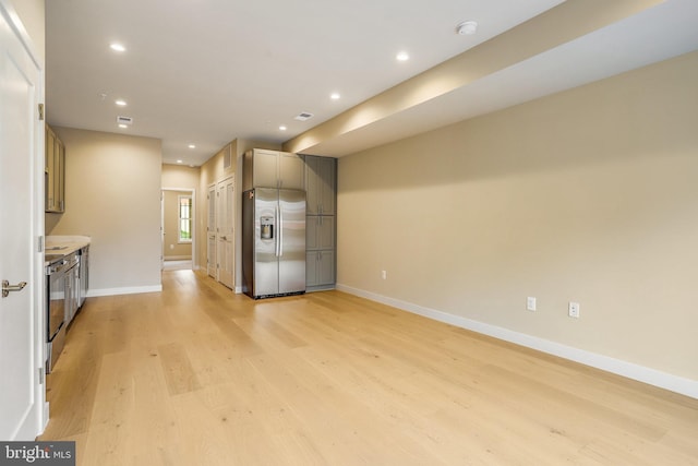 unfurnished living room featuring light hardwood / wood-style floors