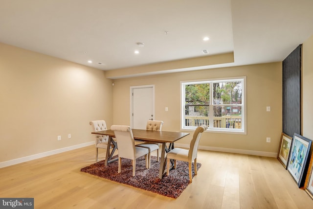 dining space featuring light hardwood / wood-style flooring