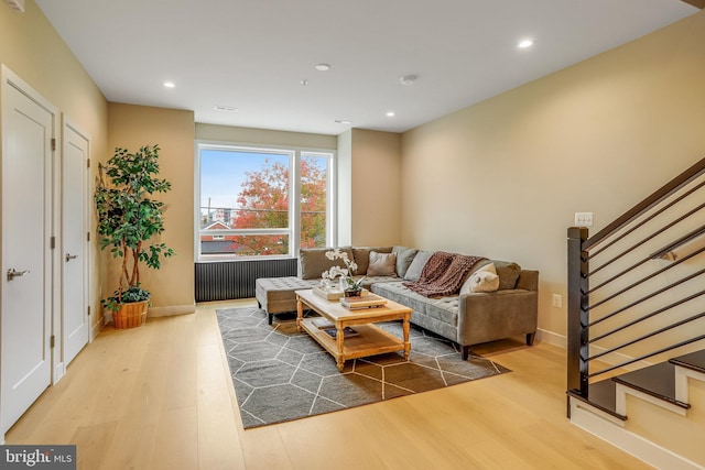 living room with hardwood / wood-style floors