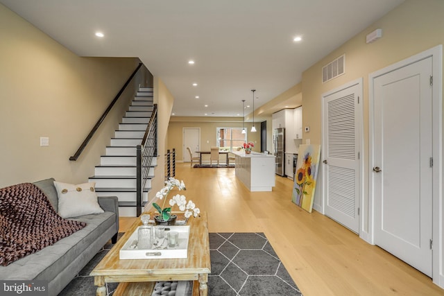 living room featuring light wood-type flooring